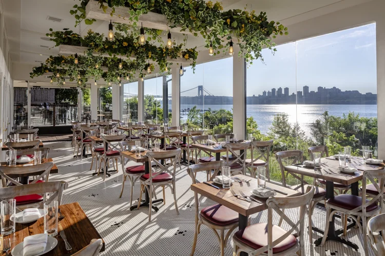Light-filled event dining room with waterfront views